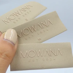3D Embossed Beige Damask Woven Web Label 3D Silicone Logo With Laser Cutting 2 Head Woven Label For Garment Silk Screen Printing