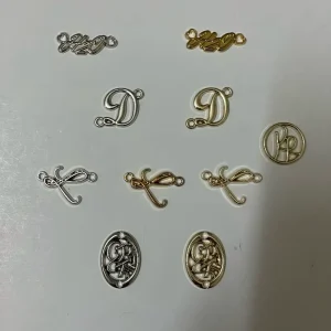 Custom Alloy Decor Fittings Cursive Letter Tags & Hollow Monogram Plates for Socks Gloves Hats & Handbags