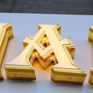 Custom Gold Stainless Steel LED Channel Letters White Acrylic Face Perforated Side 3D Illuminated Shop Logo Sign