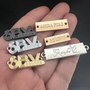 Custom Hollow Letter Sewing Tags Logo Oval Shape Alloy Metal Label Plates for Swimwear Accessory