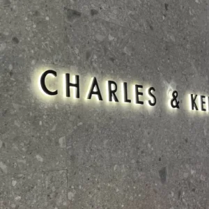 Custom Luxury Matte Black Backlit 3D Metal Letters AC Powered Warm LED Halo Effect Sign IP65 Waterproof Companies Wall Decor