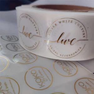 Custom PVC PET clear transparent sticker label with gold foil embossing hot stamping