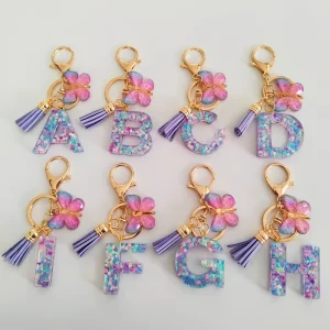 KC316 Light Purple Mixed Color Glitter Powder English Letter Resin Keychain Butterfly Tassel Bag Pendant