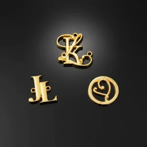 Metal Imitate Gold 2 Holes Sewing Brand Name Labels for Garment Accessories Engraved Clothing Metal Logo Labels