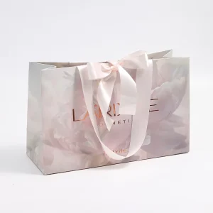 Rose Gold Foil Brand Logo Full Printed Floral Paper Gift Bag with Satin Handle for Skincare Cosmetic Wedding Boutique Packaging